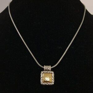 Elegant Silver and Gold Pendant Necklace
